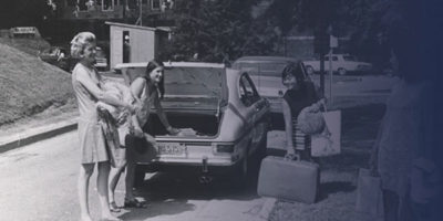Women unloading a car during move-in weekend
